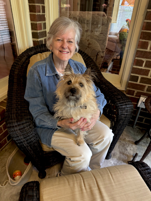 two tails up llc owner kim spyridon with her dog Cody